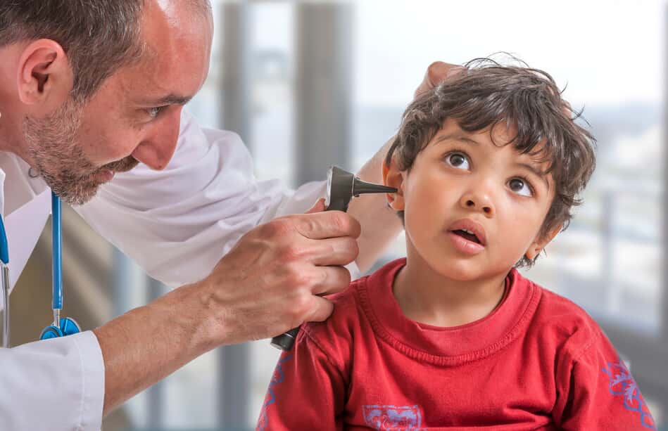 ENT looking into a boy's ear