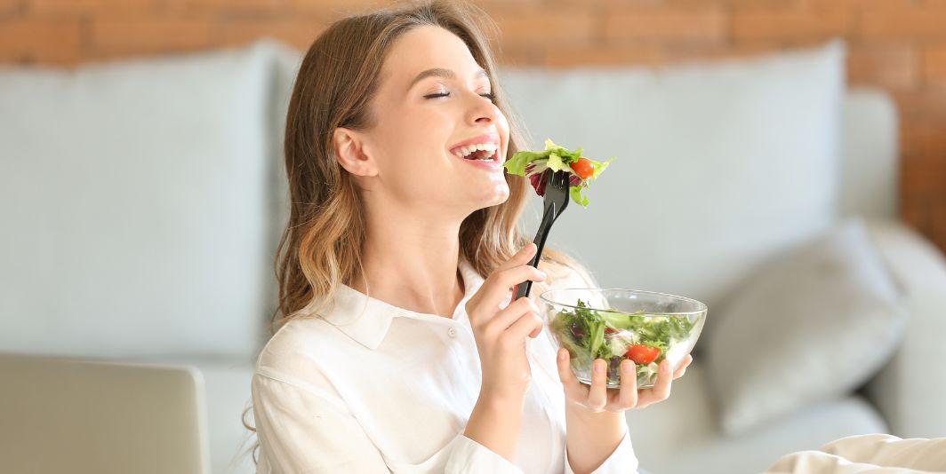 Woman eating a salad 