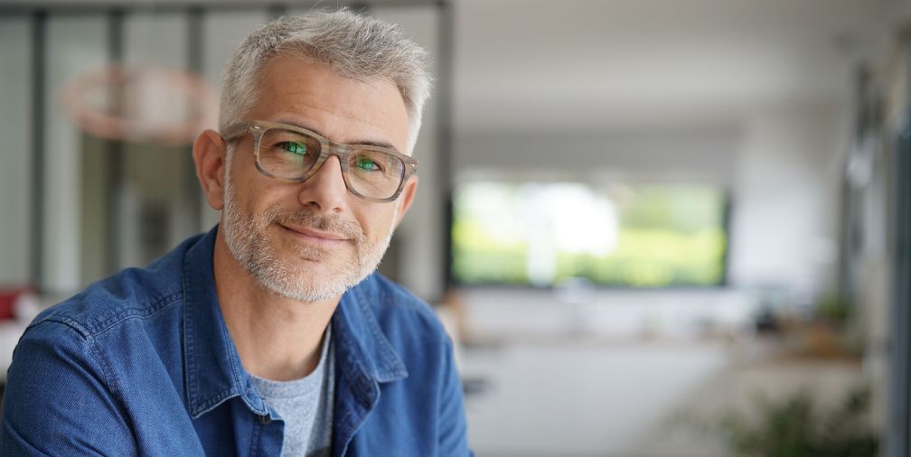 Man in glasses smiling