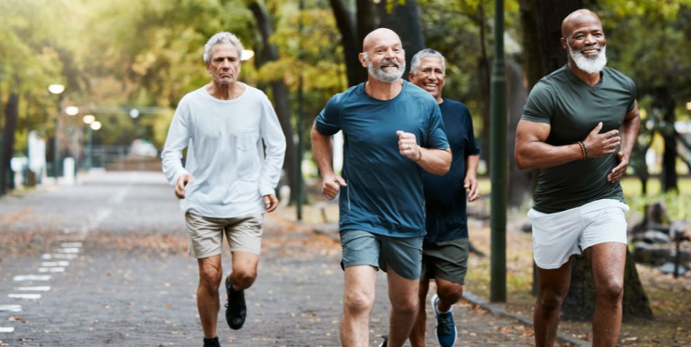 4 older male friends running