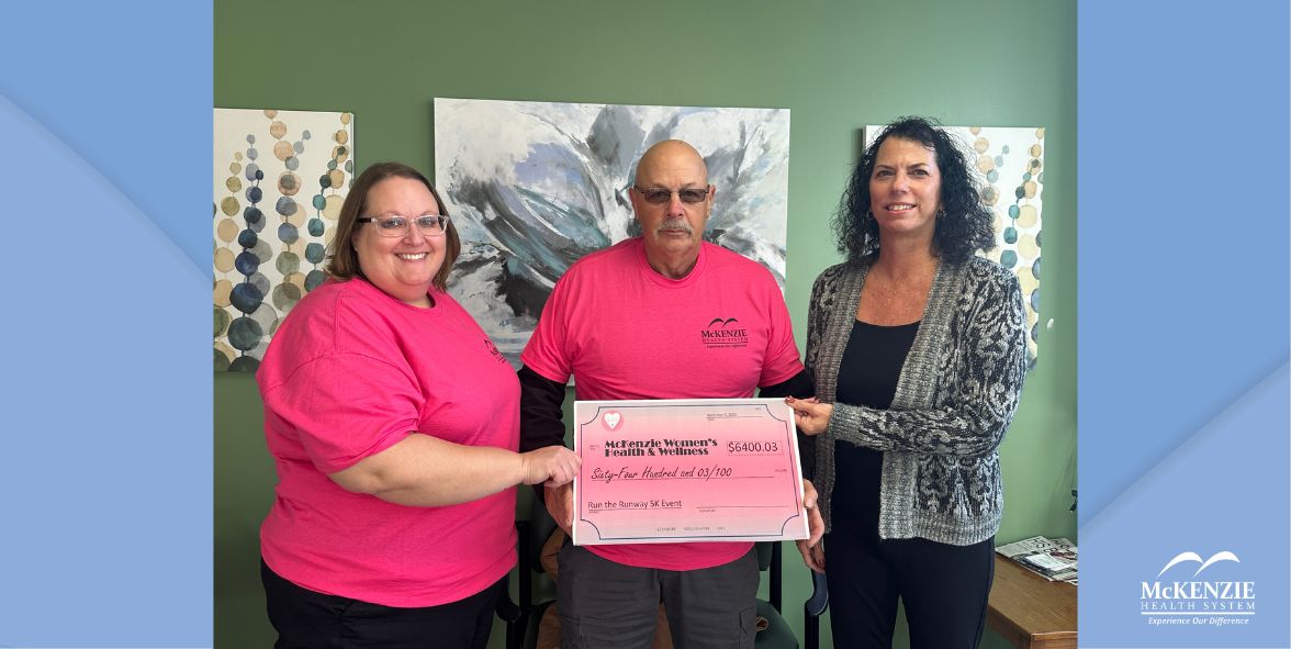  Marlena Zeidler, Sandusky Recreation Department (left) and Don Johnston, Sandusky Airport Manager award $6400.03 donation to Amy Ruedisueli, CFO at McKenzie Health System.
