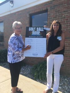 Golf Ball Drop – Winner Diane Reinke (left) and Rebecca Cambridge, Auxiliary President (right)